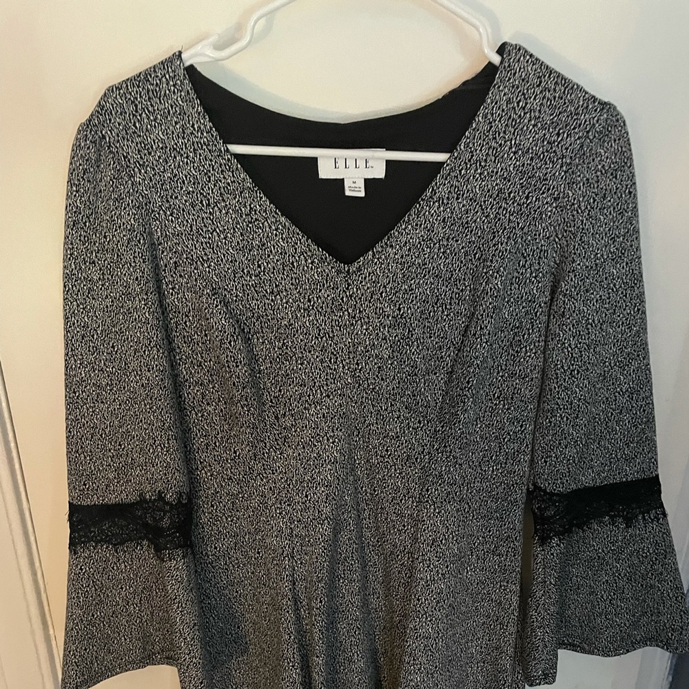 Women’s bell sleeved dress.